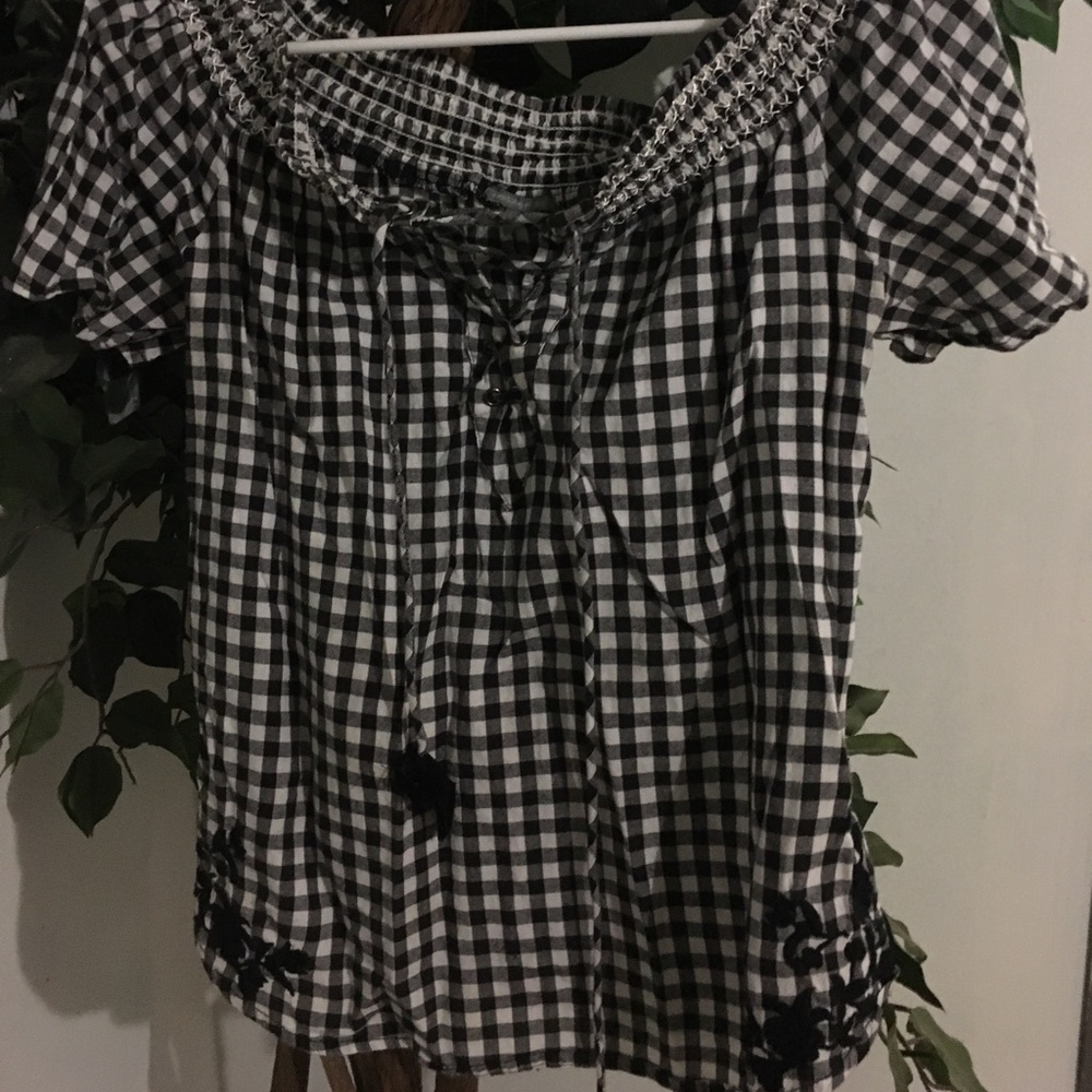 Off the shoulder black and white shirt